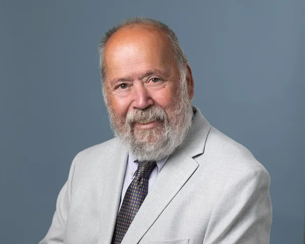 John A. Amabile, Principal